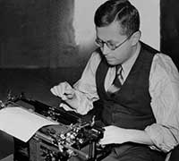 Theodore Andrica at his typewriter